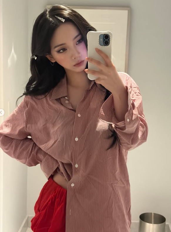 Karina's Garden-to-Mirror Moments: Backless Elegance Meets Effortless Hipster Style