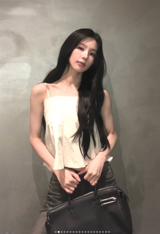 Miyeon (GIDLE) Masters Luxury Minimalism: How the Global Ambassador Elevates a Simple Bustier with Iconic It-Bags