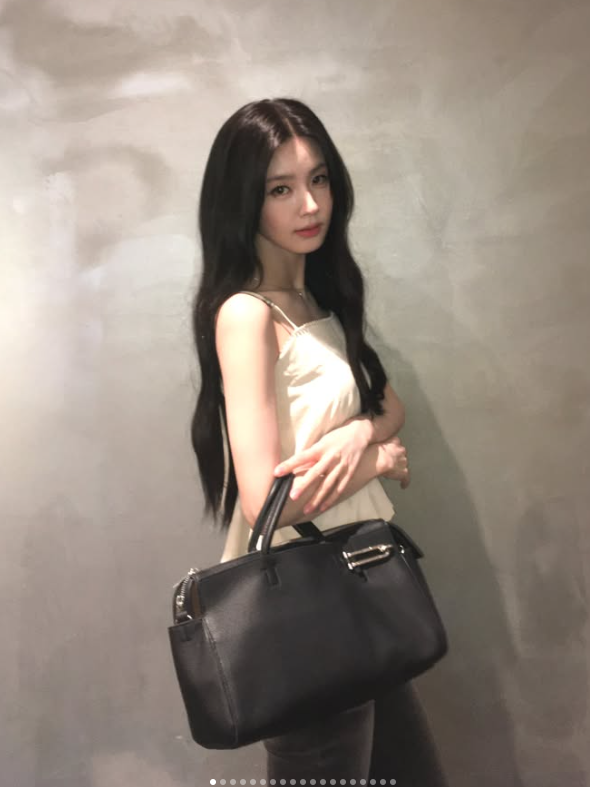 Miyeon (GIDLE) Masters Luxury Minimalism: How the Global Ambassador Elevates a Simple Bustier with Iconic It-Bags