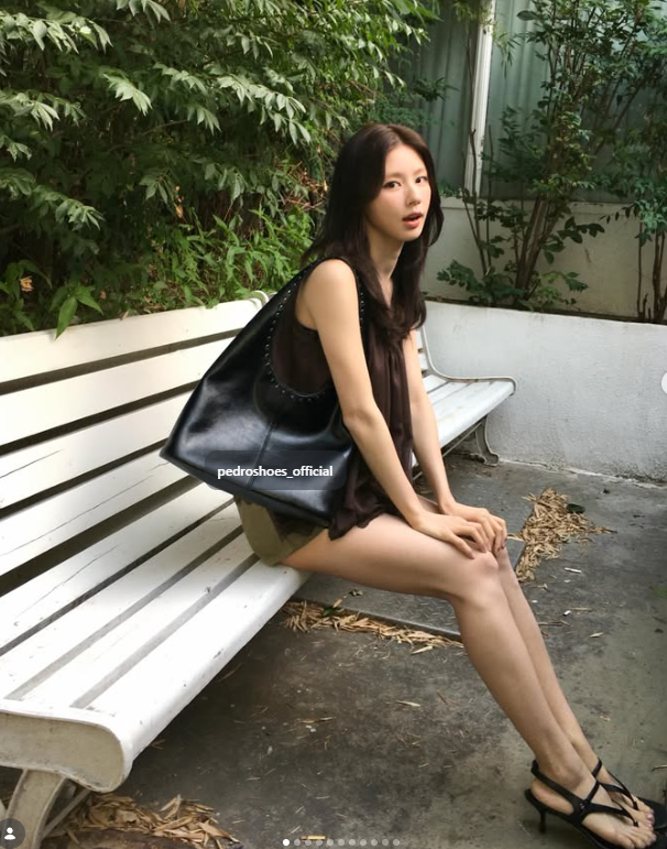 Miyeon (GIDLE) Masters Luxury Minimalism: How the Global Ambassador Elevates a Simple Bustier with Iconic It-Bags