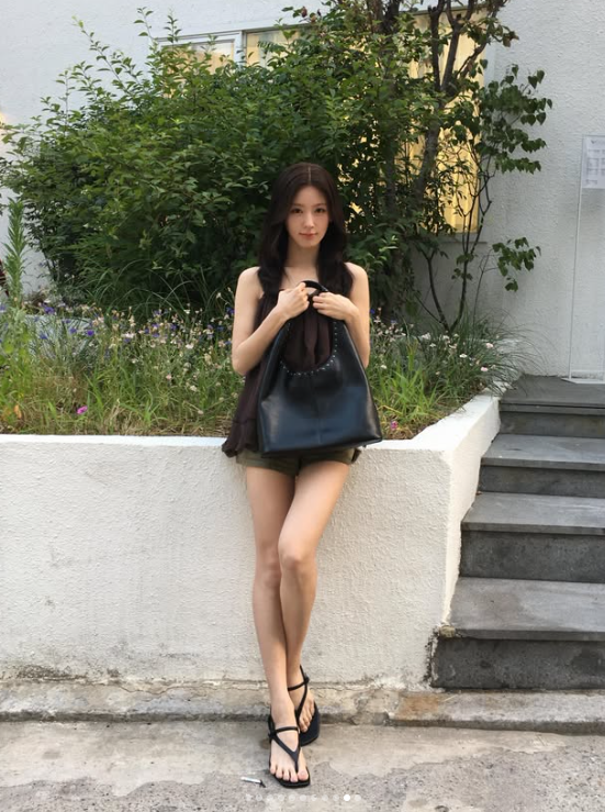 Miyeon (GIDLE) Masters Luxury Minimalism: How the Global Ambassador Elevates a Simple Bustier with Iconic It-Bags