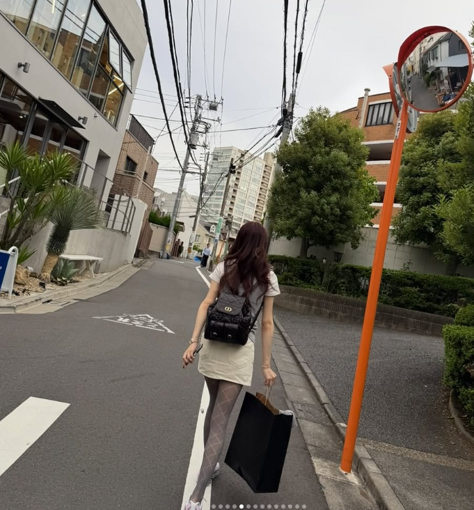 Jo I-hyun's Japan Trip Drip: Dior Backpack & Layered Tops Edition
