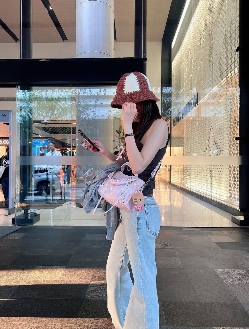 Early 40s and Still Ageless — Sandara Park's Bangkok Casual With Cropped Crochet and Bucket Hats