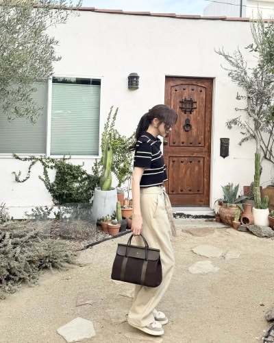 From mysterious to hilarious: Lee Ji-a's minimalist play between tough and delicate fabrics
