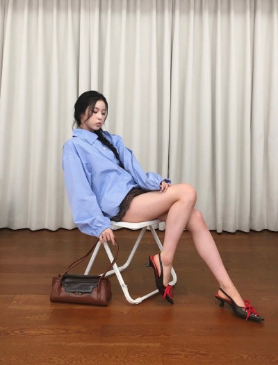 Kyujin's Elegant Escape: How NmiXX's Oldest Became a Wealthy Daughter Headed to Barcelona