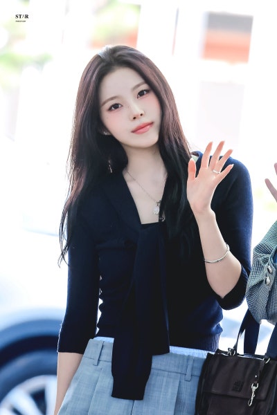 Kyujin's Elegant Escape: How NmiXX's Oldest Became a Wealthy Daughter Headed to Barcelona
