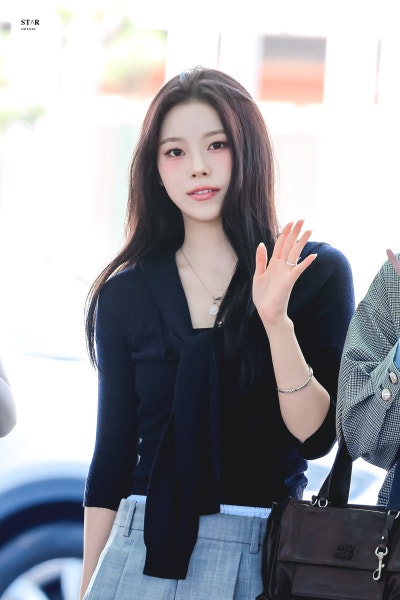Kyujin's Elegant Escape: How NmiXX's Oldest Became a Wealthy Daughter Headed to Barcelona