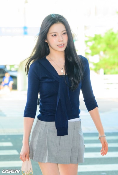 Kyujin's Elegant Escape: How NmiXX's Oldest Became a Wealthy Daughter Headed to Barcelona