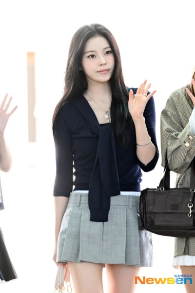 Kyujin's Elegant Escape: How NmiXX's Oldest Became a Wealthy Daughter Headed to Barcelona