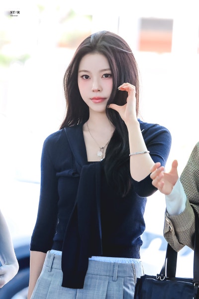 Kyujin's Elegant Escape: How NmiXX's Oldest Became a Wealthy Daughter Headed to Barcelona