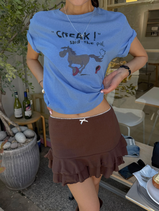 Bored of plain basic tees? This vintage horse-print top does the work of an outfit without trying