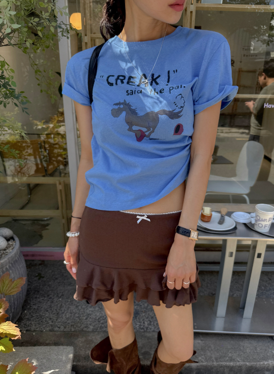 Bored of plain basic tees? This vintage horse-print top does the work of an outfit without trying