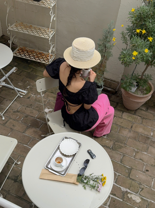 The Back Slit Blouse That Finally Makes Sitting Down Comfortable