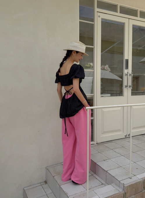 The Back Slit Blouse That Finally Makes Sitting Down Comfortable