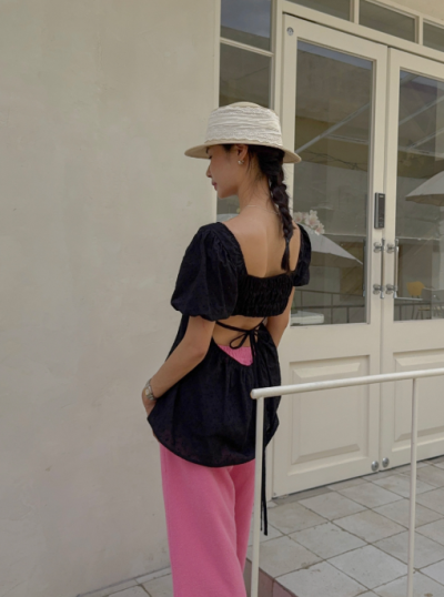 The Back Slit Blouse That Finally Makes Sitting Down Comfortable