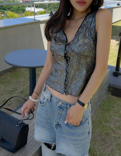 Night resort photoshoots look magazine-ready in this metallic vest — here's why everyone wants one now