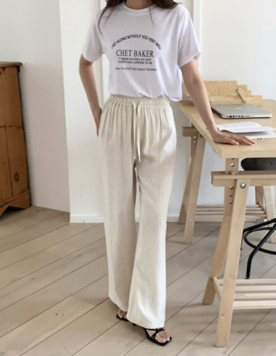 On scorching days when denim is absolutely out of the question—these linen trousers feel like wearing almost nothing but look genuinely put-together