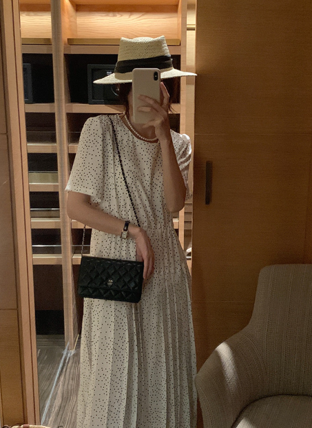 The roomy fit literally hides everything on your lower half—even my pregnant sister says she looks gorgeous in this dress