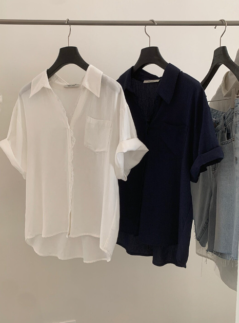Unbutton it and the charm completely takes over—this loose-fit lace shirt is a total game-changer
