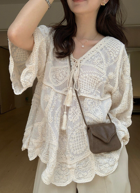 What parents ask where you got it—the lace blouse that makes mom outfits actually interesting