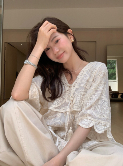 What parents ask where you got it—the lace blouse that makes mom outfits actually interesting