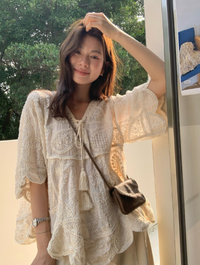 What parents ask where you got it—the lace blouse that makes mom outfits actually interesting
