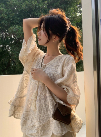 What parents ask where you got it—the lace blouse that makes mom outfits actually interesting