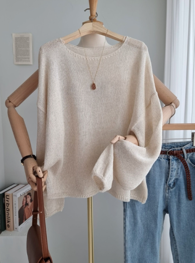 Throw it on and look effortless—the linen knit that actually breathes