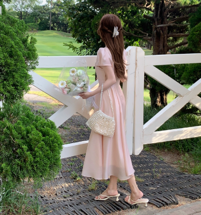 This Pink Flare Dress Is Your Secret Weapon for Looking Like a Guest Star at Every Wedding