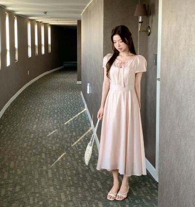 This Pink Flare Dress Is Your Secret Weapon for Looking Like a Guest Star at Every Wedding