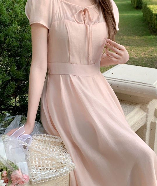 This Pink Flare Dress Is Your Secret Weapon for Looking Like a Guest Star at Every Wedding