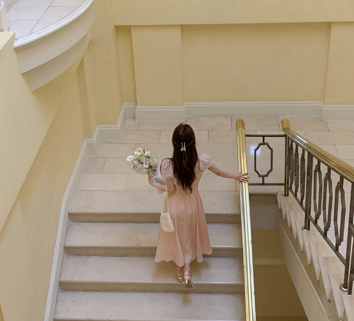 This Pink Flare Dress Is Your Secret Weapon for Looking Like a Guest Star at Every Wedding