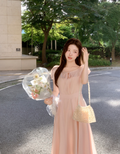 This Pink Flare Dress Is Your Secret Weapon for Looking Like a Guest Star at Every Wedding