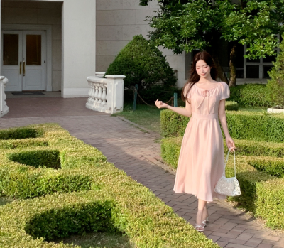This Pink Flare Dress Is Your Secret Weapon for Looking Like a Guest Star at Every Wedding
