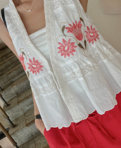 Looking for a Summer Look That Stands Out? This Vintage Tulip Vest Is Making Everyone's 'Fit Come Alive