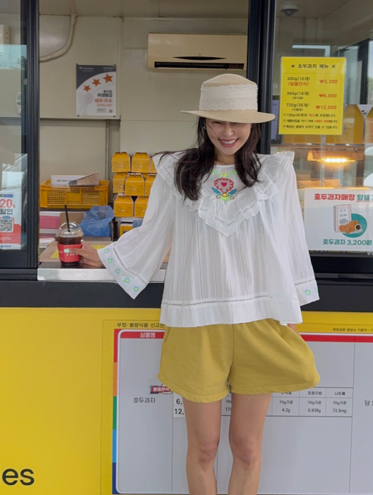 Broader shoulders? This ruffle blouse solves the whole upper-body coverage situation