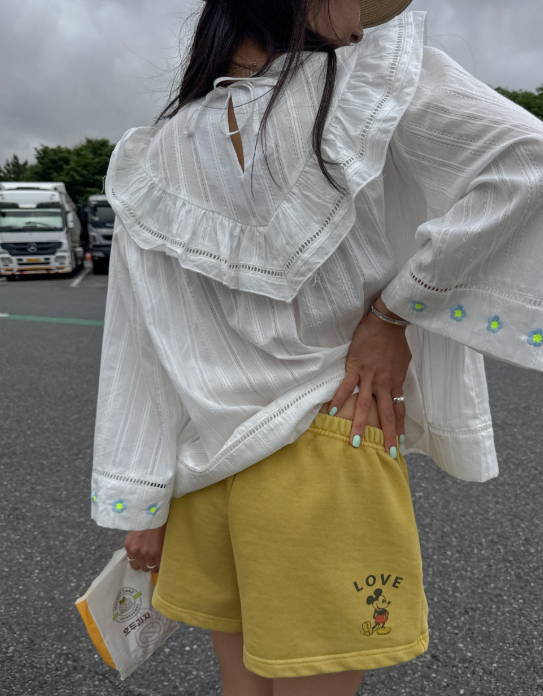 Broader shoulders? This ruffle blouse solves the whole upper-body coverage situation