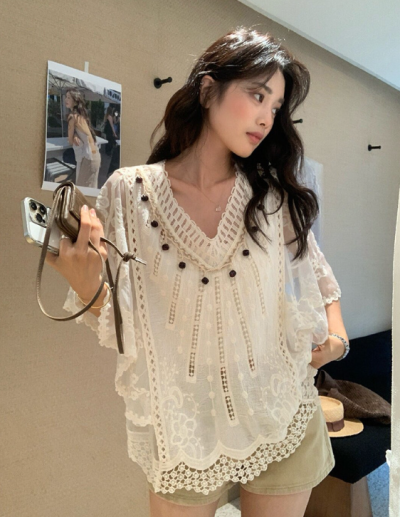 Escape-Resort Vibes Without the Passport: This Embroidered Poncho Rewires Your Entire Summer