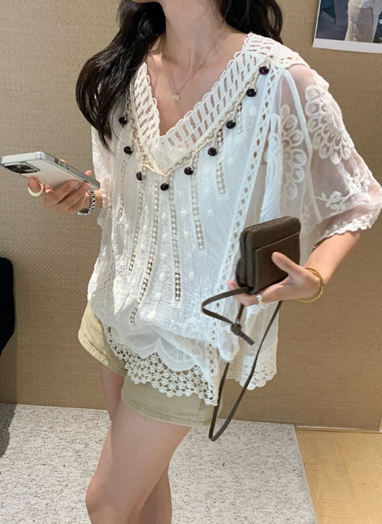 Escape-Resort Vibes Without the Passport: This Embroidered Poncho Rewires Your Entire Summer