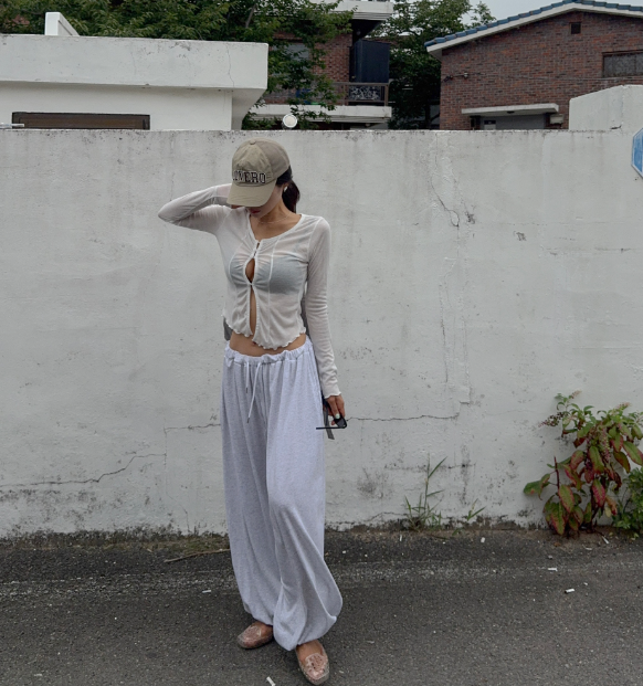 The Ribbed Cardigan That Broke the Beach: How to Wear Layered Knit Like You Invented It