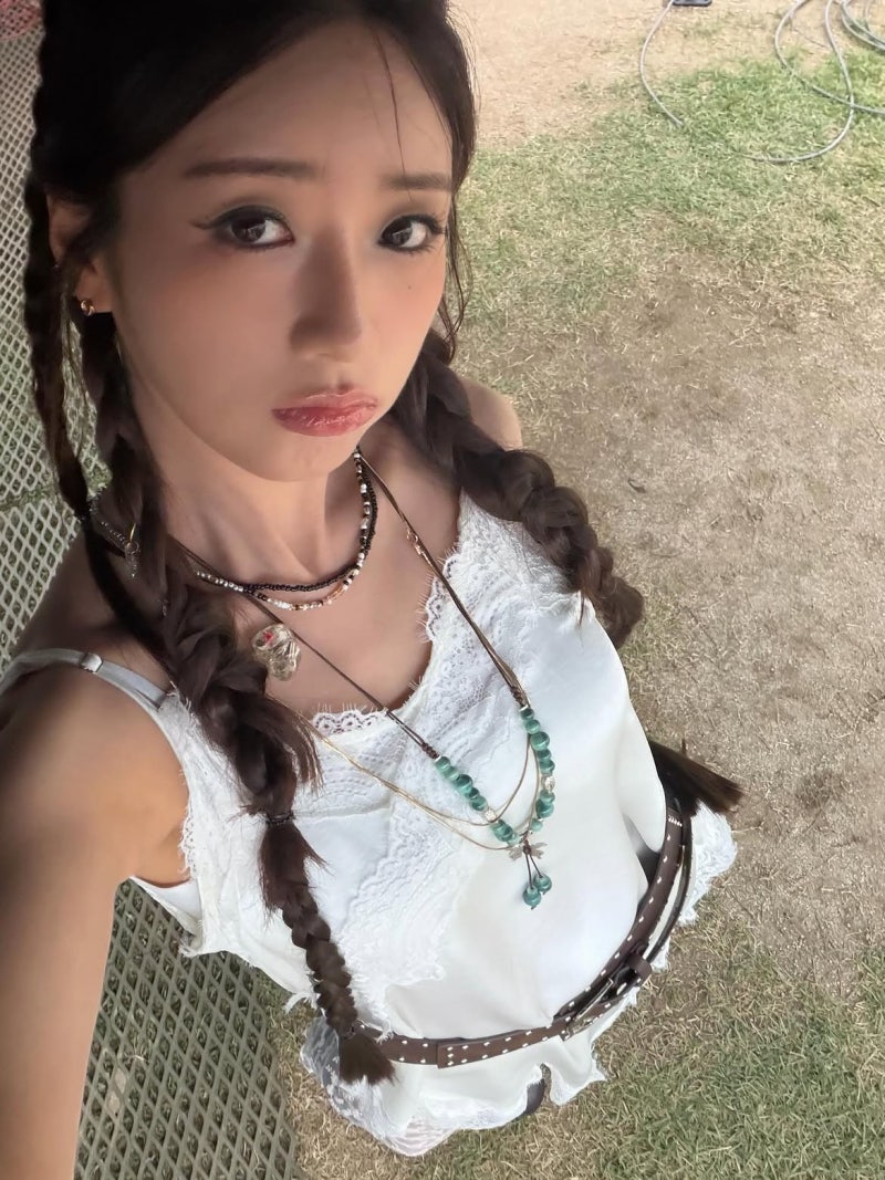 After the Wedding, Yoon Bo-mi of Apink Just Keeps Getting Riper: A Black Ruffled Cardigan Meditation