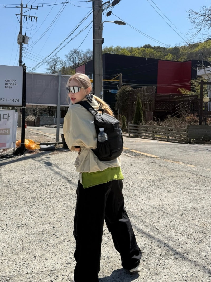Center Energy: Lee Chae-yeon's Performance Queen Aesthetic in Hiking Gear and Sequins