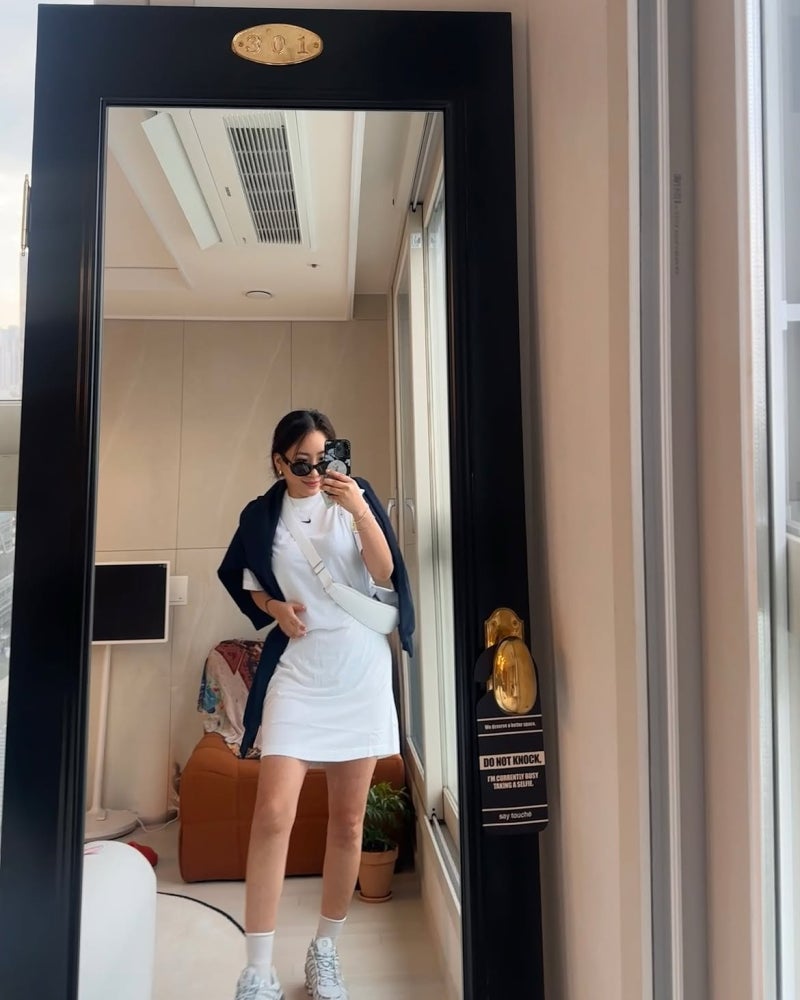 The Singer With Layers: Jo Hyeon-a Proves You Can't Fail in a Saint Laurent Raffia Bag & Summer Travel Look