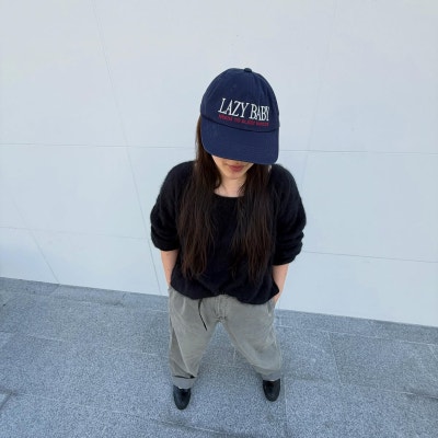 The Singer With Layers: Jo Hyeon-a Proves You Can't Fail in a Saint Laurent Raffia Bag & Summer Travel Look