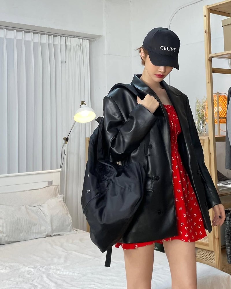 Starting with a recommendation from a school uniform shop... A chic outfit completed with a leather blazer and mini dress by "the actress who made the whole nation obsessed with short hair."