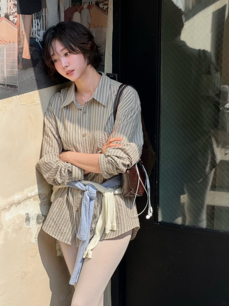 A famous celebrity causing a sensation for looking stunning in an oversized shirt with a "no pants" silhouette!