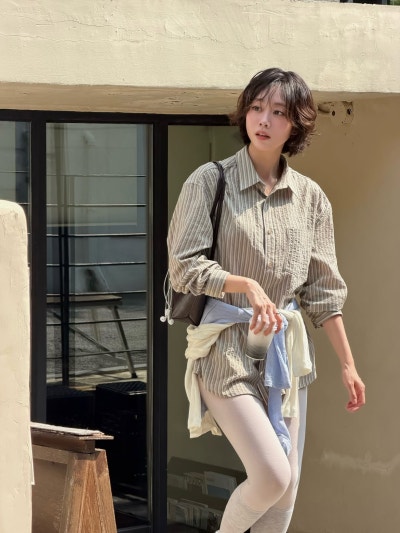 A famous celebrity causing a sensation for looking stunning in an oversized shirt with a "no pants" silhouette!
