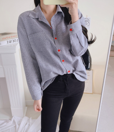 “I thought it was just an ordinary striped shirt?”… Women’s striped shirt styling with red buttons as a focal point