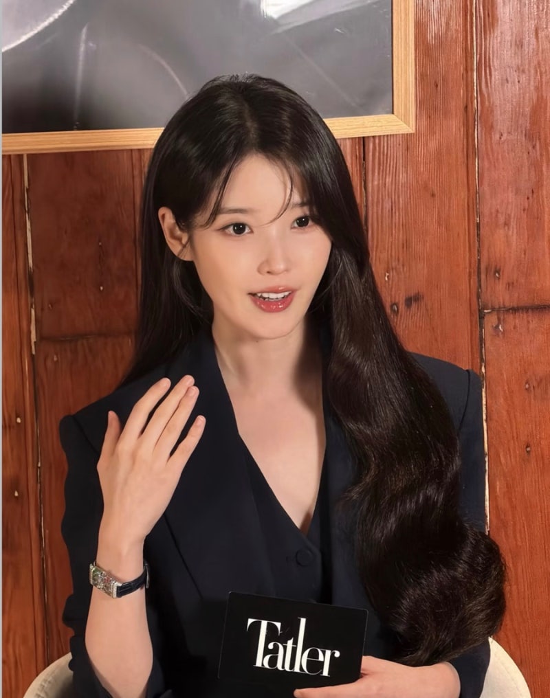 IU's fashion that makes her features look bigger after losing weight.