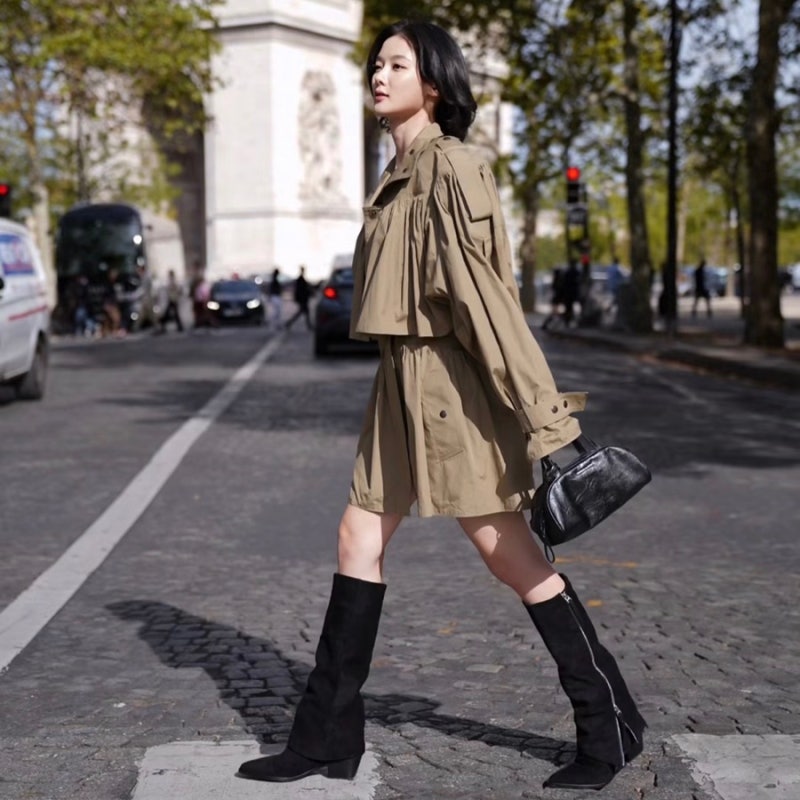 Thinks it's a runway... A celebrity girlfriend look making history with a short haircut